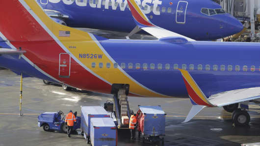 Southwest Airlines planes are loaded Tuesday, February 5, 2019 at the Seattle-Tacoma International Airport in Seattle.
