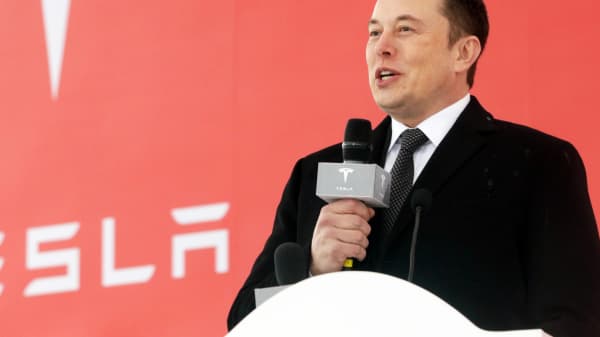 tesla to cut its workforce by around 7 percent