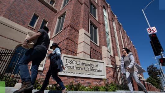 A view of people visiting the University of Southern California on March 12, 2019 in Los Angeles, California. Federal prosecutors say their investigation dubbed Operation Varsity Blues blows the lid off an audacious college admissions fraud scheme aimed at getting the children of the rich and powerful into elite universities.