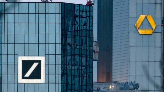 The photo taken on March 17, 2019 shows the headquarters of the German banks Deutsche Bank (L) and Commerzbank in Frankfurt am Main, West Germany.