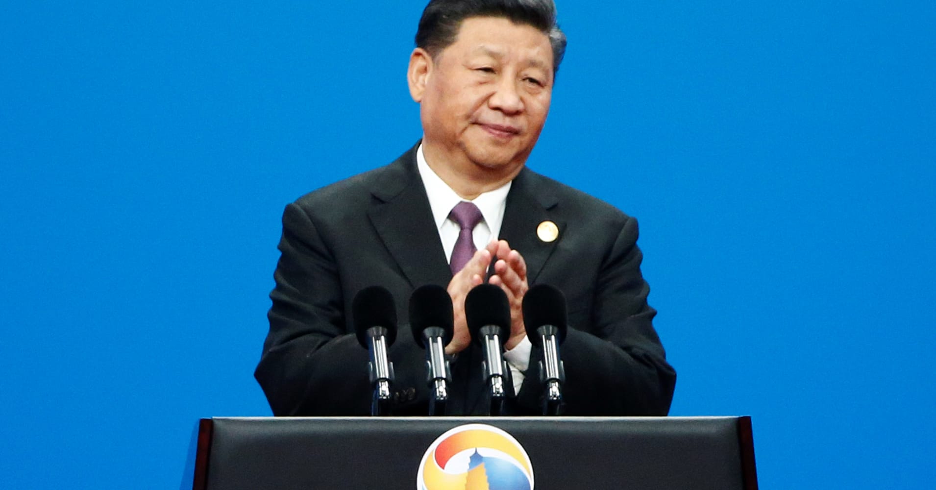 Xi tells world leaders he's committed to reforming China, but provides few details