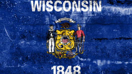 Wisconsin State Flag painted on grunge wall