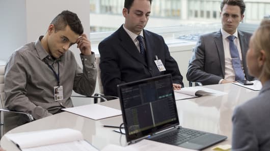 Rami Malek (left) as Elliot in the pilot for USA Networks' 'Mr. Robot,' in which Malek played a cybersecurity engineer who also is involved with a vigilante hacking network.